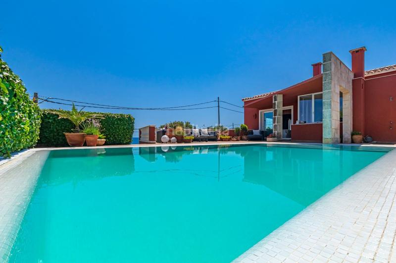 Foto 71bc7c34-f0c8-4a44-9e9f-8f3844ac29d7. Chalet fantastica villa con vista al mar en punta prima en Sant Lluís