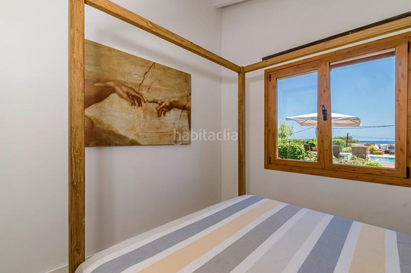 Foto 8e71ccc1-f27b-40d6-adcb-6379d6770351. Chalet fantastica villa con vista al mar en punta prima en Sant Lluís