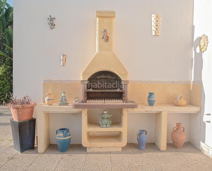 Foto 5ad891b7-9b5d-4132-9377-592fbf49166c. Casa villa 4 hab con piscina sobre una parcela amplia de 1027m en Sant Lluís