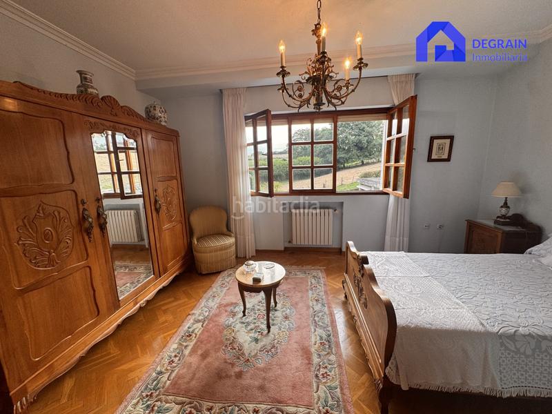 Foto 2b6e3898-54c6-421a-aa44-43538bfe3d05. Casa chalet independiente con pisicna en pola . en Siero