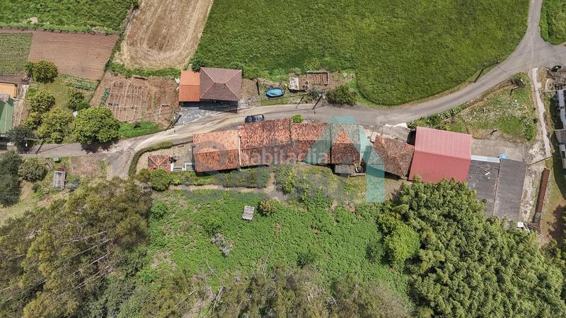 Foto d971dac2-4772-47af-b2f5-1526c8a77517. Doppelhaus mit heizung parking in Carreño