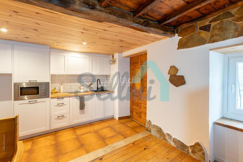 Foto c7fc9c32-2289-46ef-b4c5-ad7508c56d6e. Casa pareada en Lena