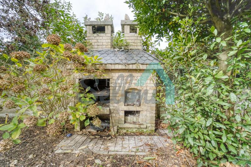 Foto 7057af0c-c6f7-430e-b6cd-99d2256beff3. Casa amb calefacció aparcament piscina a Somió Gijón