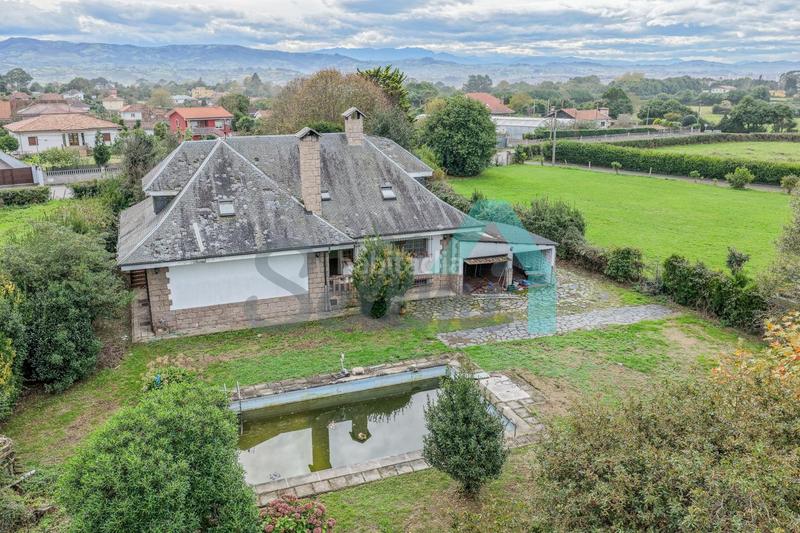 Foto 211ddb90-b0b1-4249-a4a6-cf2fed2df360. Maison avec chauffage parking piscine dans Somió Gijón