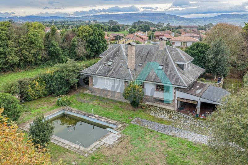 Foto 3f2a241a-f1db-45a2-a94e-d455e2321763. Maison avec chauffage parking piscine dans Somió Gijón