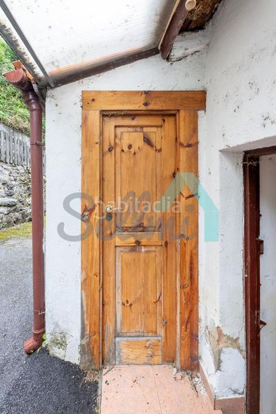 Foto acb662bb-a8c1-4522-870b-9a02ff4c9a8c. Casa adossada a Aller