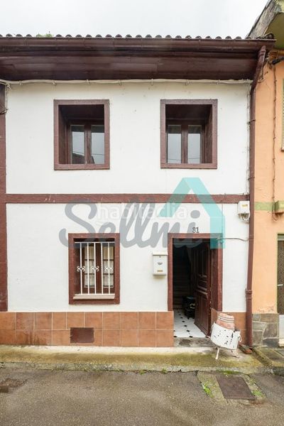 Foto eddbb083-a00c-4170-81cc-263b7461bc63. Casa adossada a Aller