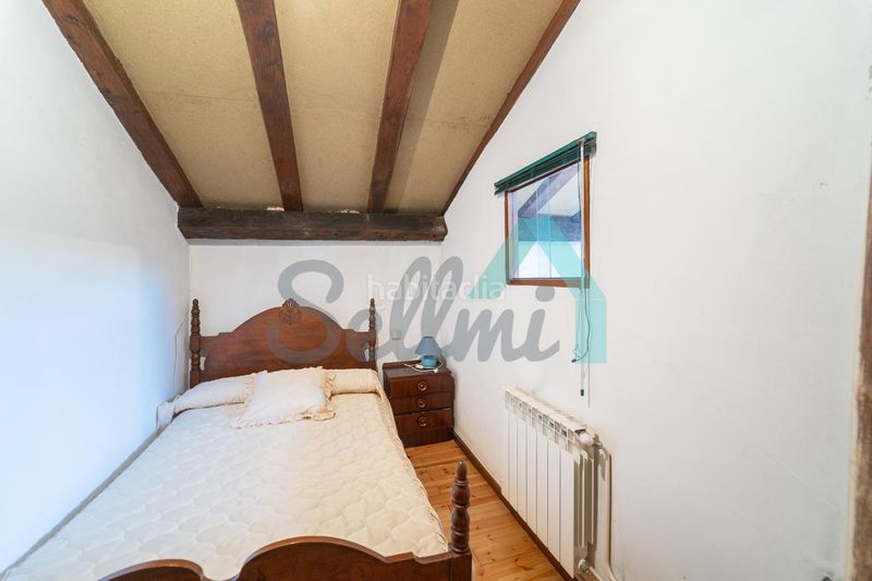 Foto 125567a8-d1c6-4b81-90ef-e786ca2a2912. Casa adosada en Onís