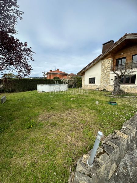 Foto 8a10aa78-843e-4a01-b1e6-53bf74bb5e6b. Xalet amb xemeneia calefacció aparcament piscina a Llanera