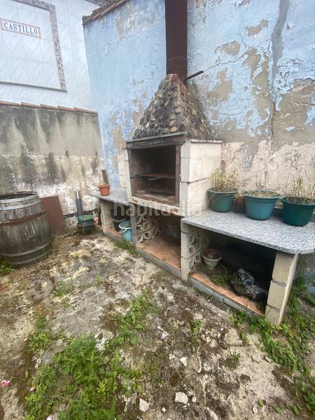 Foto 462559c6-9054-42f9-b2c2-7380f0551b12. Casa  con garaje, local y patio en Lada Langreo