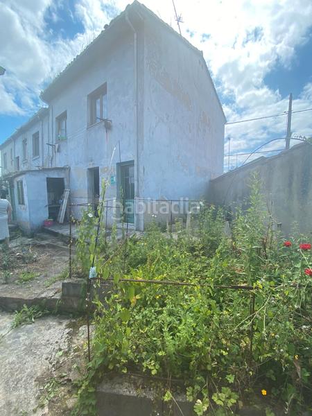 Foto b5e35068-37f4-46a8-90be-7cdd1d7b8882. Casa  con garaje, local y patio en Lada Langreo