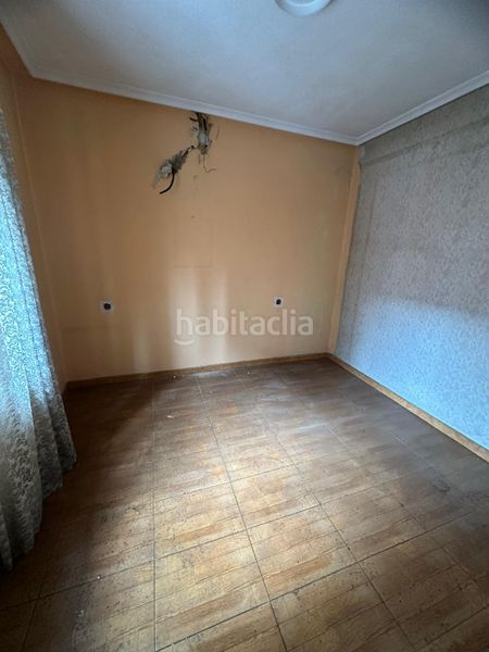 Foto 1a008a60-52fc-470a-b272-9f8c37c215a2. Edificio  con garaje y dos viviendas en Sama en Langreo