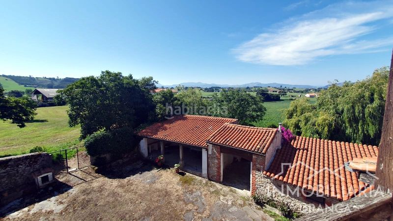 Foto 99d879c0-5813-48e9-ad39-36a9547501e1. Chalet casona montañesa de piedra con 5.000 m de terreno ideal para inversión o negocio rural en Ribamontán al Mar