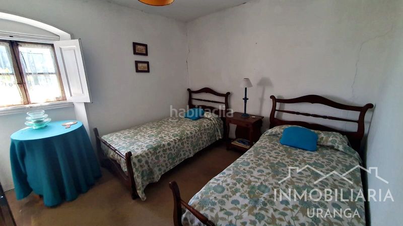 Foto cdedbb49-68ce-4deb-882c-1154bf30fd8c. Chalet casona montañesa de piedra con 5.000 m de terreno ideal para inversión o negocio rural en Ribamontán al Mar