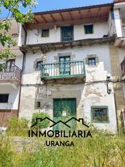 Casa  Lendagua. Casa adosada de piedra en guriezo