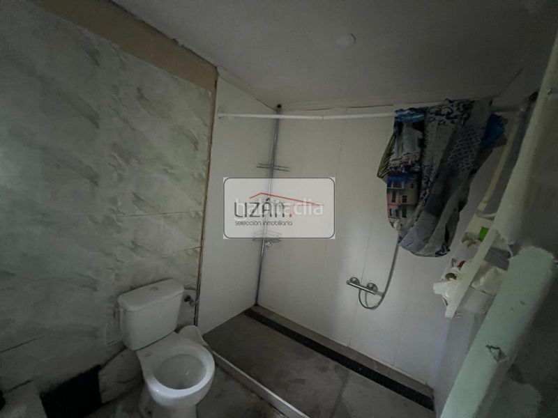 Foto c677c2a0-44a1-4ac0-a596-005fa0b63412. Casa a lada - barrio las tejeras 53 a Sama Langreo