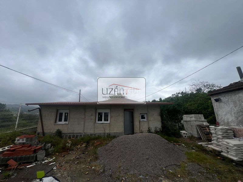 Foto f98da504-17be-4c5f-aa0e-45e1358c437c. Casa a lada - barrio las tejeras 53 a Sama Langreo