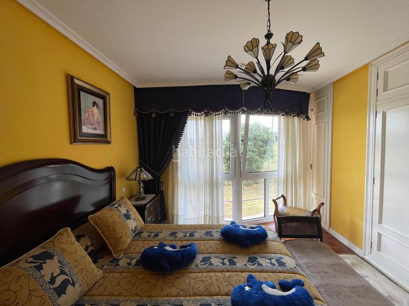 Foto 5437d53a-6162-45d7-9b76-25b4ef6e8e61. Casa amb calefacció aparcament piscina a Leorio Gijón