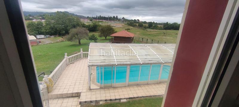 Foto 7a373879-af0d-4eff-b64a-4db7746dd32c. Casa amb calefacció aparcament piscina a Leorio Gijón