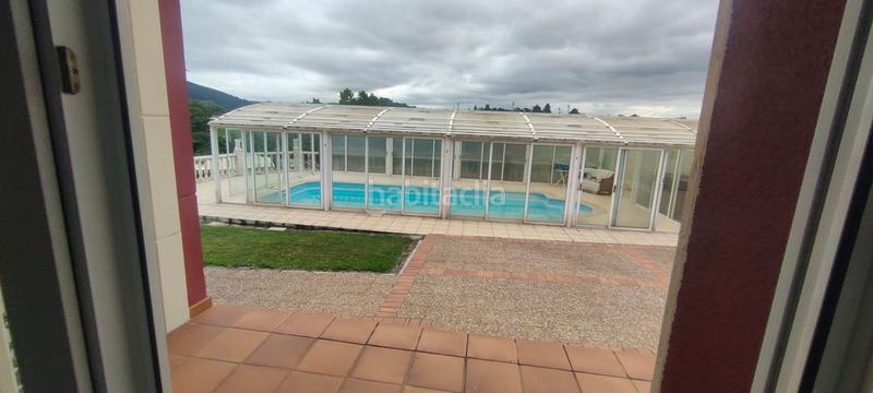 Foto d534ae1d-6067-4111-9b08-68937e18b263. Casa amb calefacció aparcament piscina a Leorio Gijón