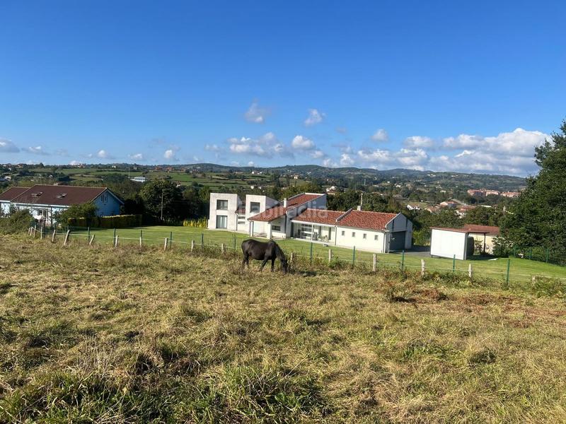 Foto c602a7e5-a105-4018-9d87-90a330b361ab. Terreny residencial a la pola Siero Siero