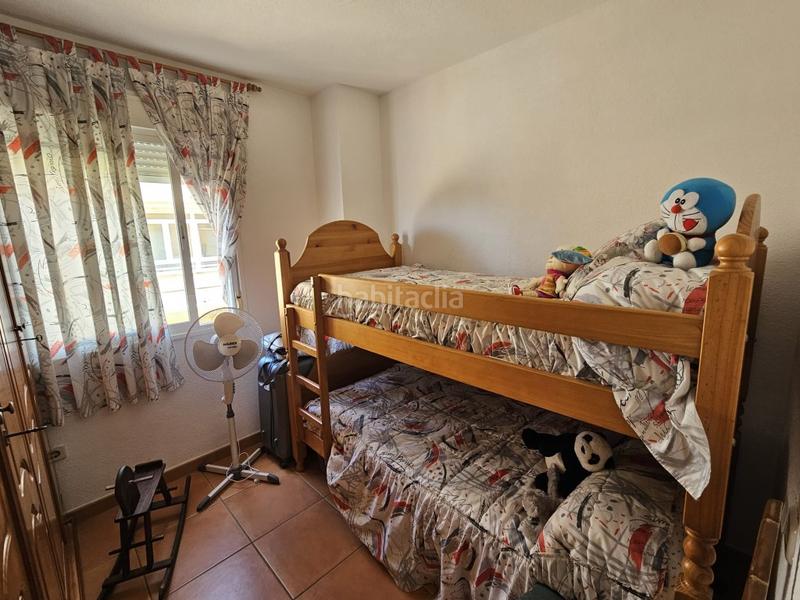 Foto d101d863-cb69-41ae-95b1-f3cf0437102c. Alquiler piso encantador piso con piscina y plaza de parking costa! en Torrox