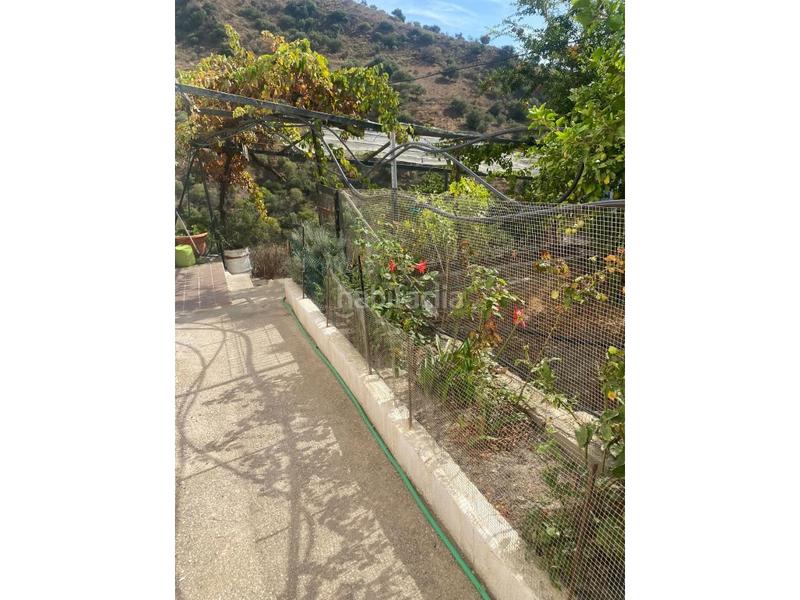 Foto 6b8e1114-1ea1-4ea5-9381-a2bfde969a07. Casa amplia casa con terraza y garaje ! en Canillas de Aceituno