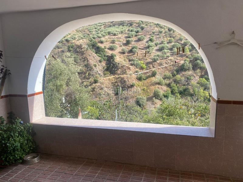 Foto cd3244af-6d56-47d4-b892-4251e47f7f71. Casa amplia casa con terraza y garaje ! en Canillas de Aceituno