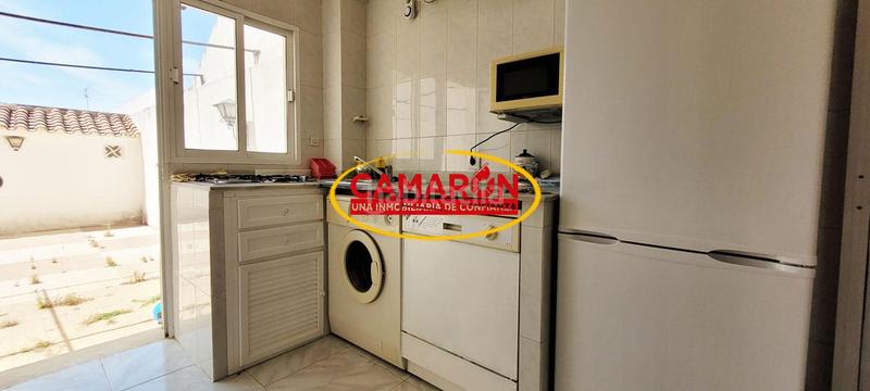 Foto 1c6a92d4-88a2-49e7-b6c1-2ef73640caaf. Casa adossada a Puebla del Río (La)