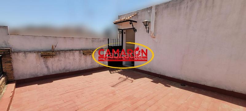 Foto ad4fa97a-d065-40c1-925c-b07cf044b587. Casa adossada a Puebla del Río (La)