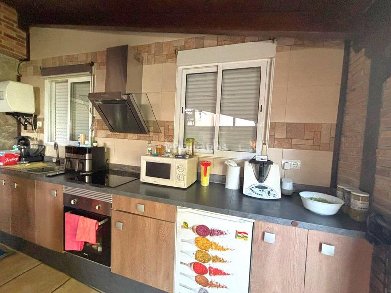 Foto ae44c436-81f0-4ca1-bc74-2da0388637f0. Casa a schiera con riscaldamento parcheggio piscina in Villamediana de Iregua