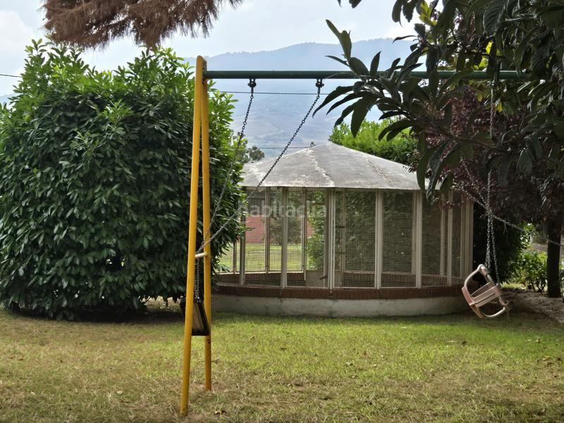 Foto 0c40af87-4c2d-4eec-bf8f-5d29c0f8c335. Casa se presenta una magnífica oportunidad para aquellos que buscan una vivienda espectacular en un entorno idílico. esta impresionante en Nalda