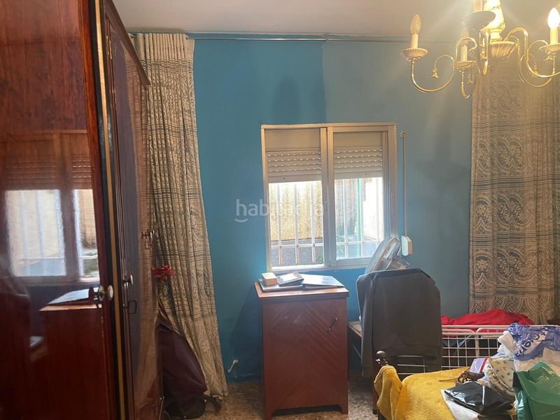 Foto e5b39635-ceb7-496e-a3d3-cf98cc8e83b7. Casa aparellada a Montecarmelo Madrid