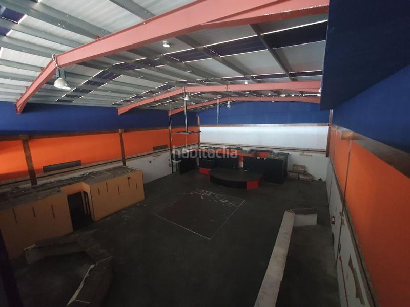 Foto c5455c26-8f0b-40f2-86ee-3c18ce027f98. Bâtiment à usage industriel dans Llaranes Avilés