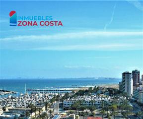 Appartement à Platja de la Pobla de Farnals. Apartamento reformado actual con piscina en playa la puebla de f