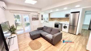 Appartement à Platja de la Pobla de Farnals. Apartamento reformado actual con piscina en playa la puebla de f