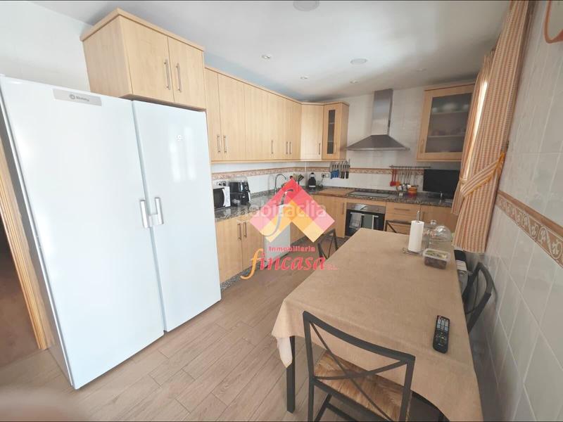 Foto c833c1cf-aa22-4413-9a32-503ede065725. Casa aparellada amb aparcament piscina a La Planilla Ronda