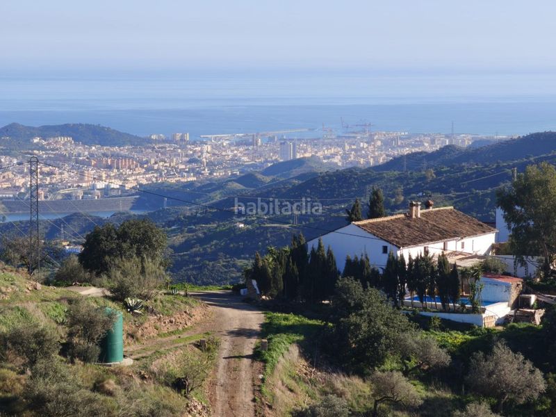 Foto 13de525f-3c59-4c92-9e39-bb4eca3bb751. Finca rústica a Residencial Jardín Botánico Málaga