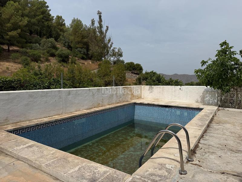 Foto edc9a957-314f-4084-bbb4-fd4e5bbc3b45. Xalet amb aparcament piscina a Limonar Málaga