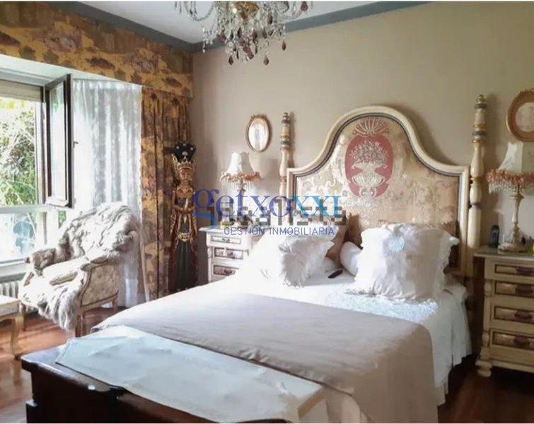 Foto decfbee8-a64c-4ea3-8d41-11d61ed17095. Appartamento con camino riscaldamento parcheggio in Getxo