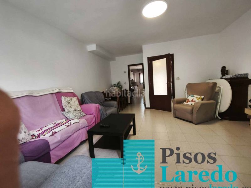 Foto 067723d3-cc90-46dd-b56e-4d4ccb9d3519. Casa adossada amb calefacció aparcament a Zona Playa Laredo