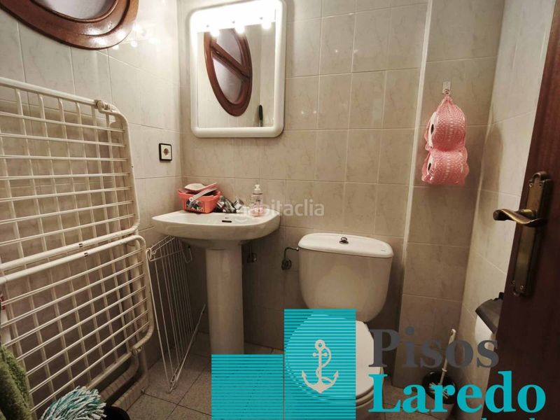 Foto 15c4c1d3-15f6-4736-a6ae-ab94e2c4a88a. Casa adossada amb calefacció aparcament a Zona Playa Laredo