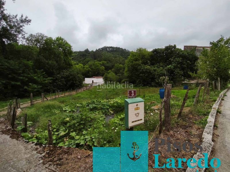 Foto cc4283a2-6ae8-4cb9-903e-0d814e99fc97. Casa aparellada amb aparcament a Rasines