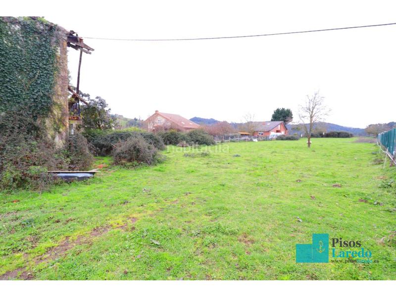 Foto 0abcd2fc-c172-4014-8d64-22489218cb06. Finca rústica a seña 1 a Centro Laredo