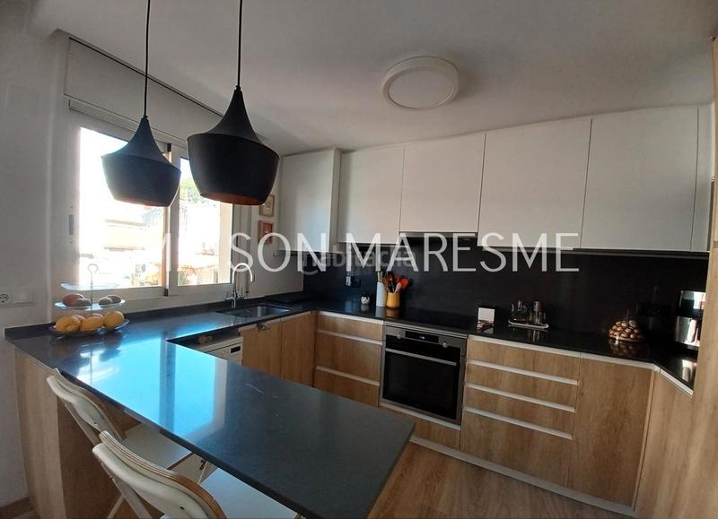 Foto 79e0c1c6-33b3-4df7-b5bd-038ad2ab6b90. Dúplex tripex en venta en Canet de Mar