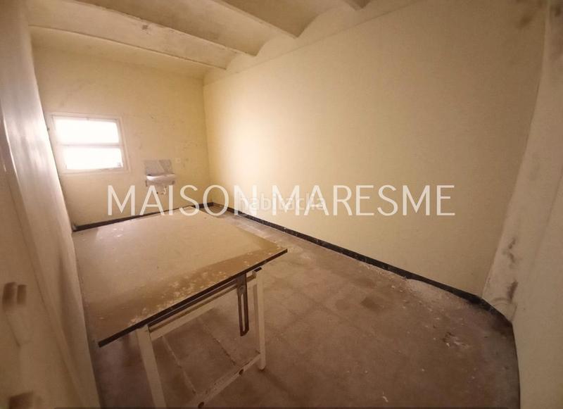 Foto 688d0b3d-16c9-42bf-bb7e-9b7c5ebbb6de. Local comercial local en venta, en pleno centro en Canet de Mar