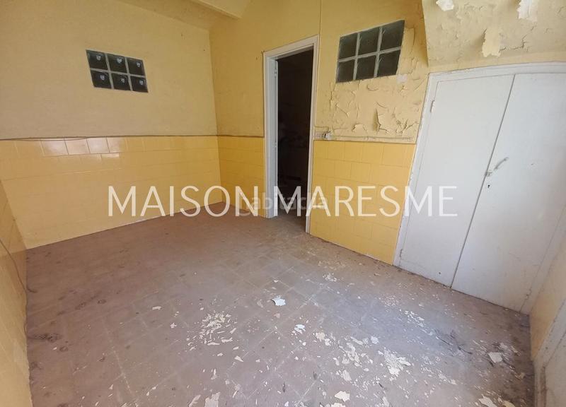 Foto db0fa282-b1c6-41ce-aa58-579e6403f63d. Local comercial local en venta, en pleno centro en Canet de Mar