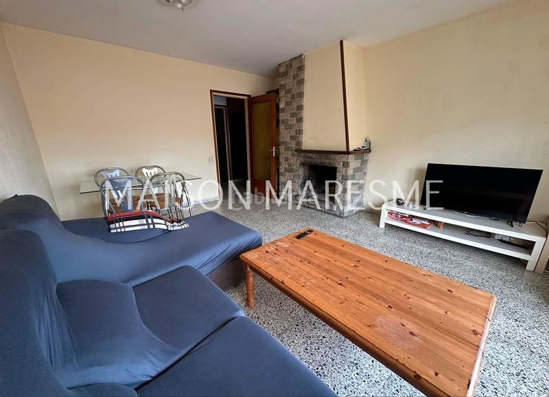 Foto c9a0a9ed-1ca8-4c89-abbd-033bc2a4a036. Flat with fireplace in Canet de Mar