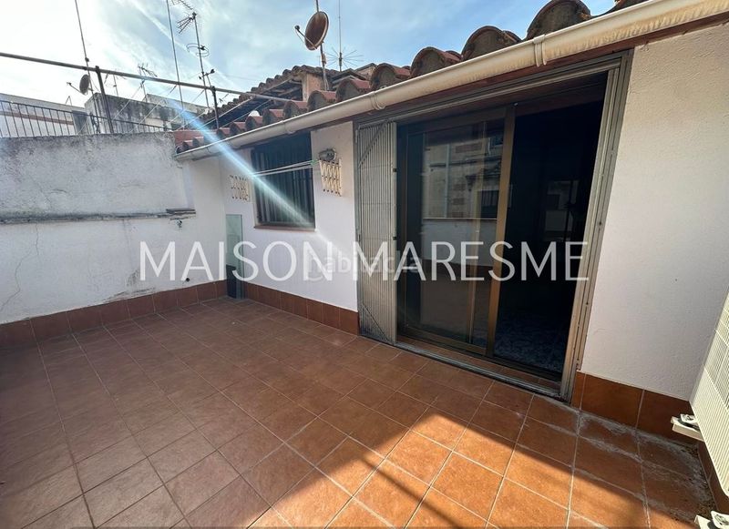 Foto 381e4a1a-7056-49f6-b853-70945371dd78. Casa adossada a Canet de Mar