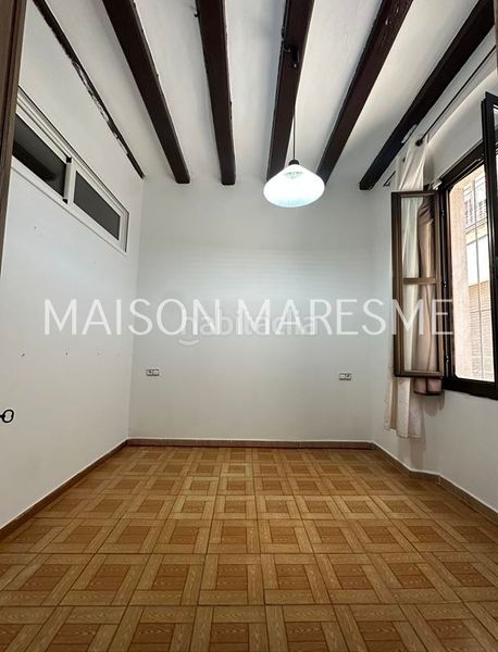 Foto f4f18c14-b225-45d4-82be-7c41515f8ed9. Casa adossada a Canet de Mar